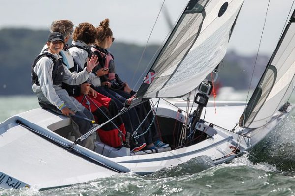 A crew on a white act at Cowes Week