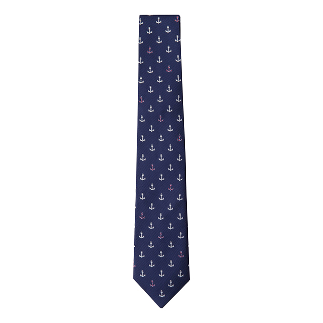 A blue silk tie with anchors on it