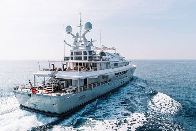 A white superyacht at sea