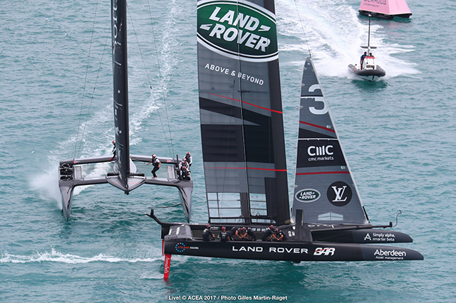 Two America's Cup racing cats on the water