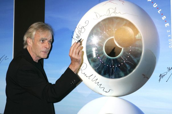 A member of Pink Floyd signs an eye picture