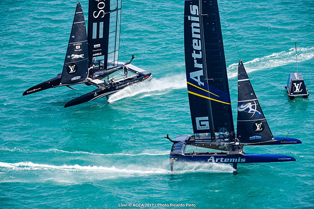 Two America's cup boats foiling